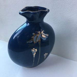 Deep blue bud vase with artistic floral design